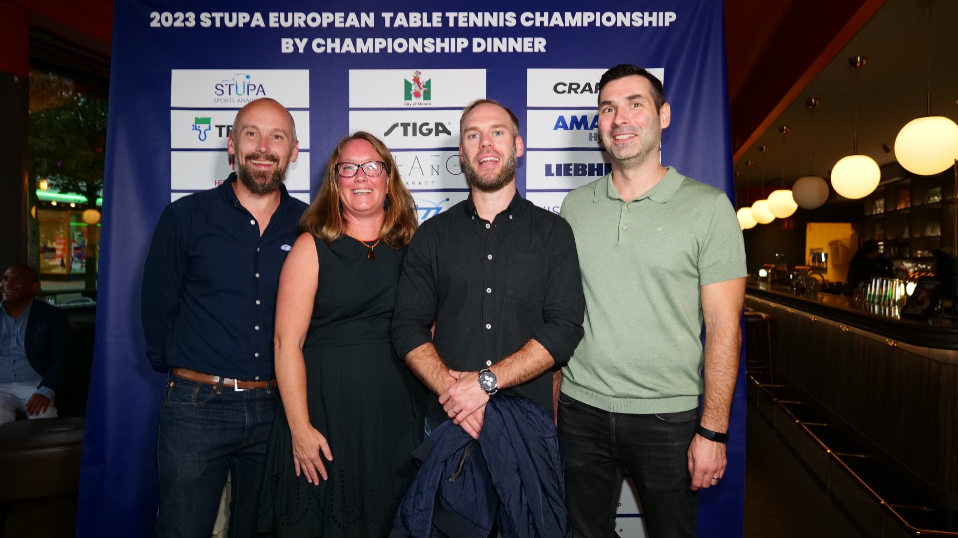 Partner representatives in front of the sponsor wall with STIGA and Craft at the World Champions' Dinner